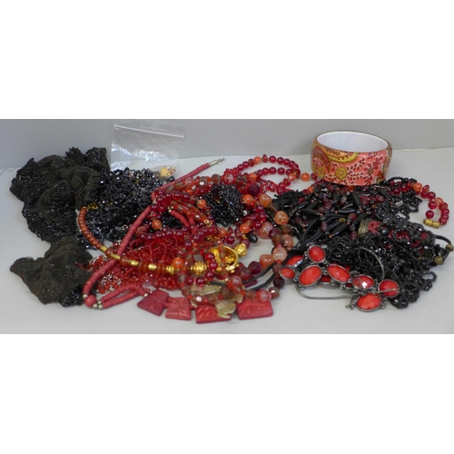 641 - A collection of black and red costume jewellery