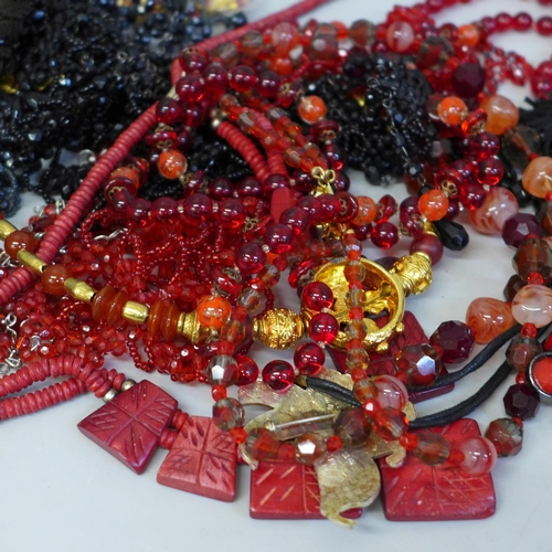 641 - A collection of black and red costume jewellery