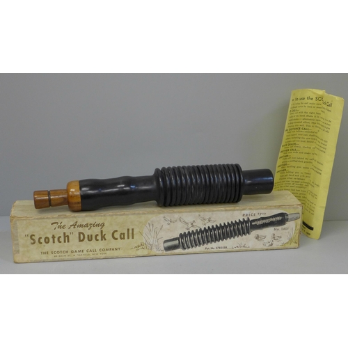 642 - The Scotch Game Call Company, New York duck call device, boxed