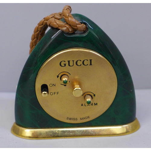 643 - A Gucci malachite travel clock