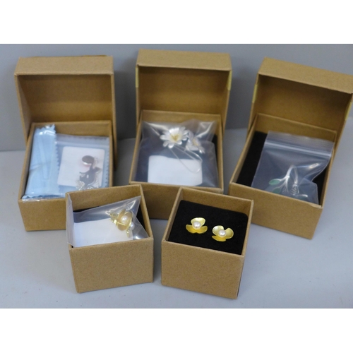 647 - Three pairs of silver earrings, a silver cat necklace and a silver ring, all boxed