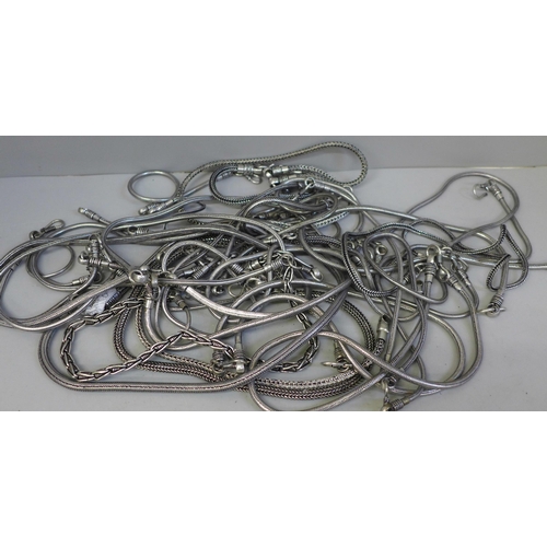 655 - Handmade Indian chains and bracelets, 33 pieces in total, possibly low grade silver