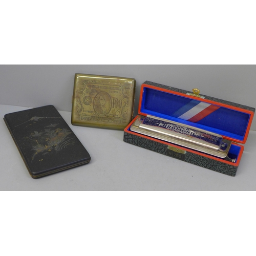 659 - Two cigarette cases and a cased Hohner Super Chromonica harmonica