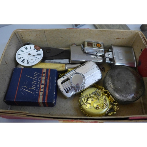 661 - A box of assorted items; cigarette lighters, cigarette case, pocket watch, etc.