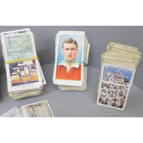 678 - A collection of cigarette cards including Ogdens, Wills and Players