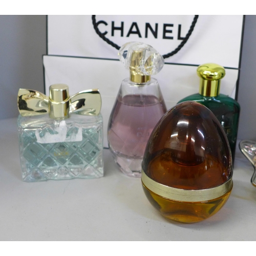 686 - A collection of perfumes, a mirror, etc.