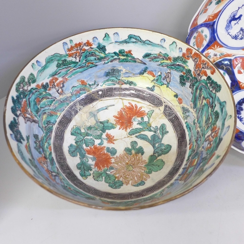 692 - Three Imari dishes, one with chip to rim, a large Chinese bowl, damaged and restored and a pot pourr... 