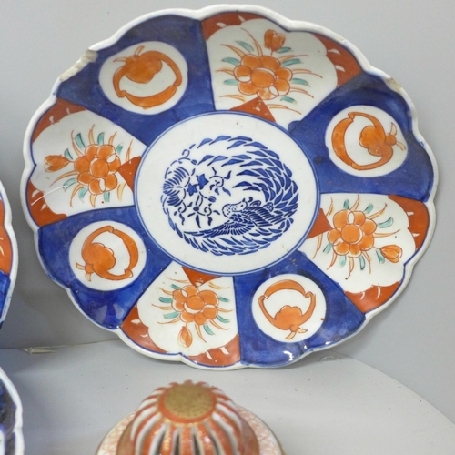 692 - Three Imari dishes, one with chip to rim, a large Chinese bowl, damaged and restored and a pot pourr... 