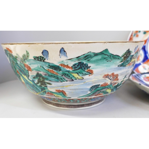 692 - Three Imari dishes, one with chip to rim, a large Chinese bowl, damaged and restored and a pot pourr... 