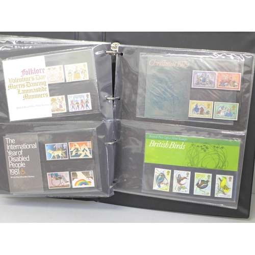 700 - Stamps; an album of pre and post decimal small format GB presentation packs (44)