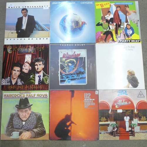 701 - Eighteen LP records including Bruce Springsteen, B52s and The Associates