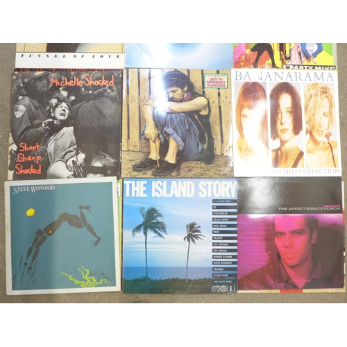 701 - Eighteen LP records including Bruce Springsteen, B52s and The Associates