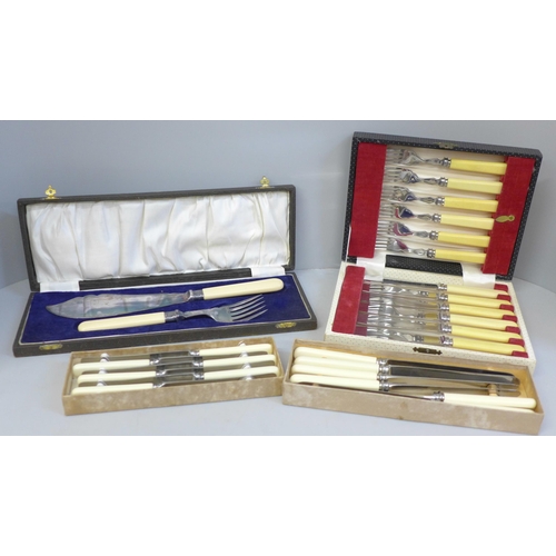 702 - A collection of plated, bone handled cutlery, fish knives withi silver collars