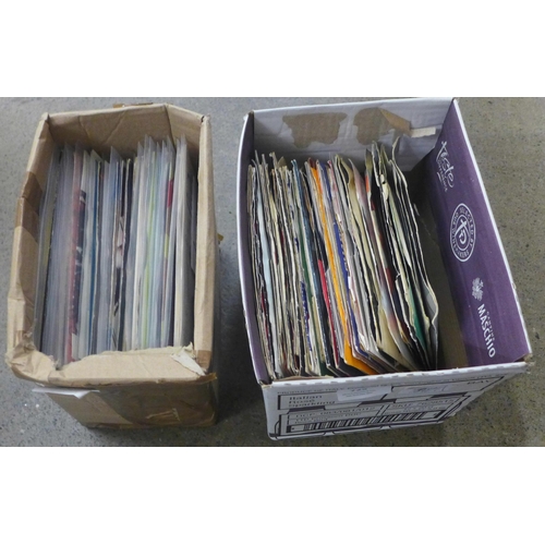 729 - Two boxes of 45 rpm 7