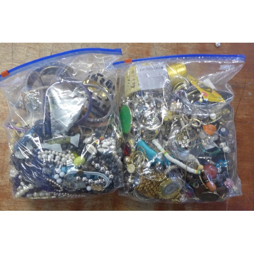 754 - Two bags of costume jewellery