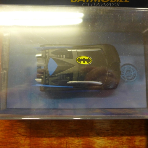 756 - Die-cast model vehicles, Batmobile Cutaways Special Edition Guide and Model, four model tanks, etc.