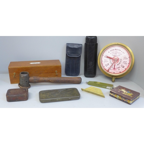 783 - A box of assorted items; brass clock, gauges, cigar cases