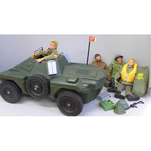 787 - Four vintage Action Man figures and a kit bag and vehicle