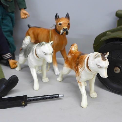 797 - Three Action Man figures, motorbike and side car and three dogs