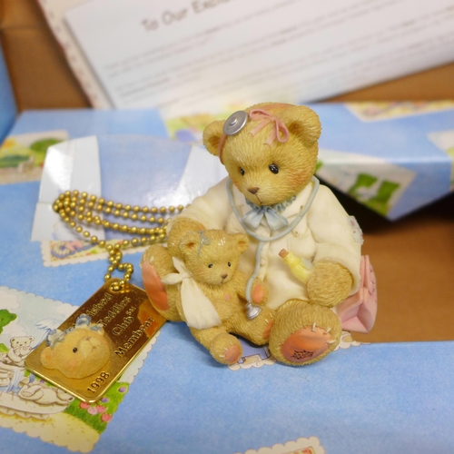 808 - A Cherished Teddies Romeo and Juliet with balcony display and two collector's sets, one incomplete