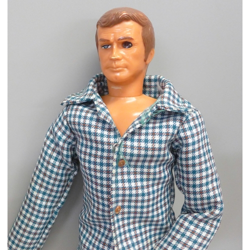 814 - Three vintage action figures including Six Million Dollar Man and Johnny West