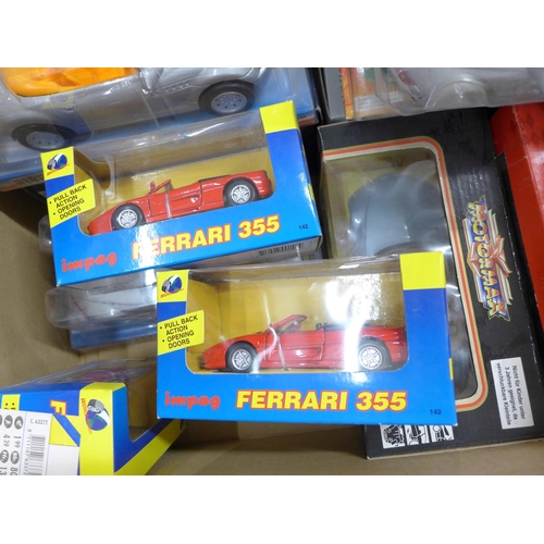 831 - A collection of model sports cars, boxed