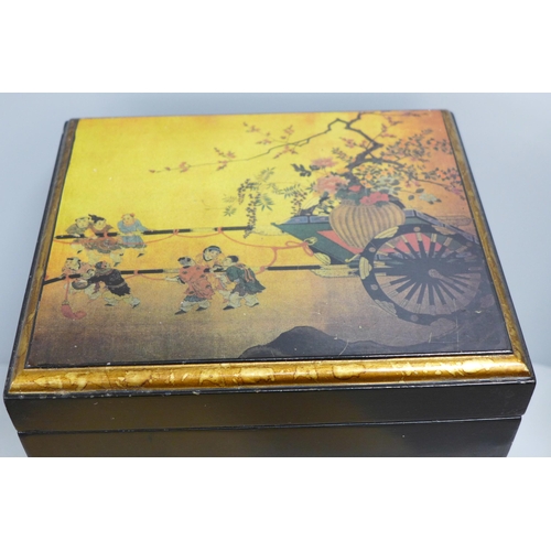 853 - An oriental style jewellery chest with assorted jewellery in one drawer