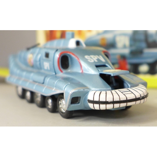 876 - A die-cast Schuco Racer 1036/1, Dinky Toys Captain Scarlet Spectrum Pursuit Vehicle, box a/f, Captai... 