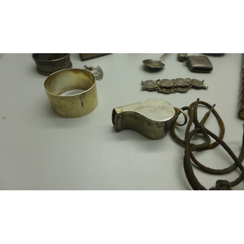 914 - A collection of silver and some plated items, napkin rings, umbrella handles, etc.