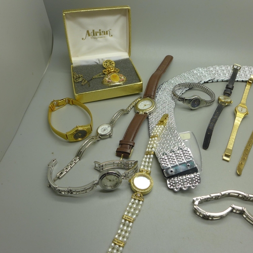 916 - A collection of lady's wristwatches, a belt and a scent bottle