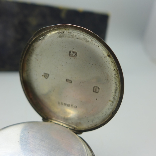 923 - A silver cased pocket watch and a Baty dial gauge