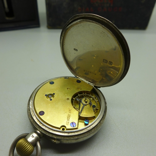 923 - A silver cased pocket watch and a Baty dial gauge