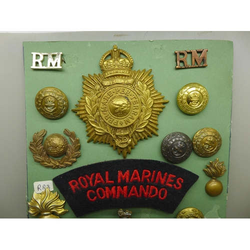 940 - A collection of Royal Marines badges