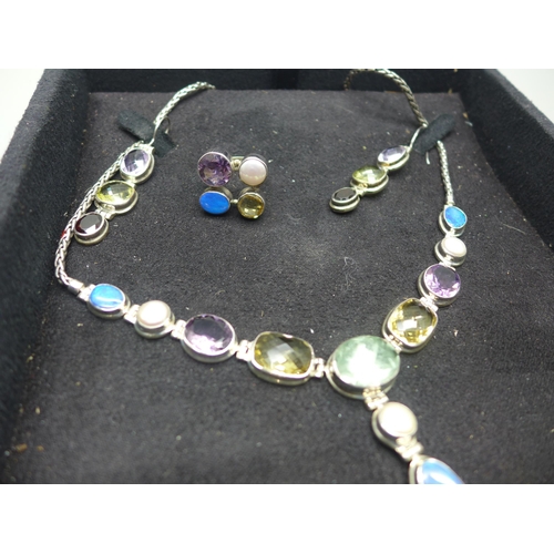 949 - A silver designer gem set necklace, earrings and ring, stones include opal, amethyst, etc.