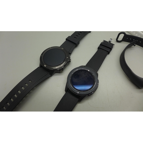 951 - Four smart watches including Samsung Galaxy and Fitbit