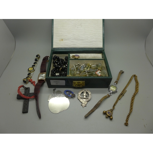 965 - A jewellery box containing costume jewellery, a fob, crucifix, watch, etc.