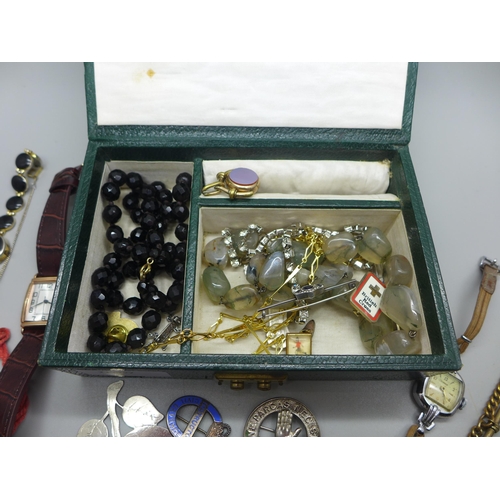 965 - A jewellery box containing costume jewellery, a fob, crucifix, watch, etc.