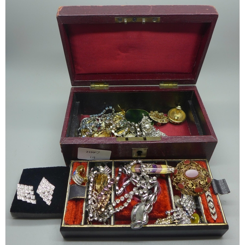 966 - A jewellery box containing costume jewellery including paste set