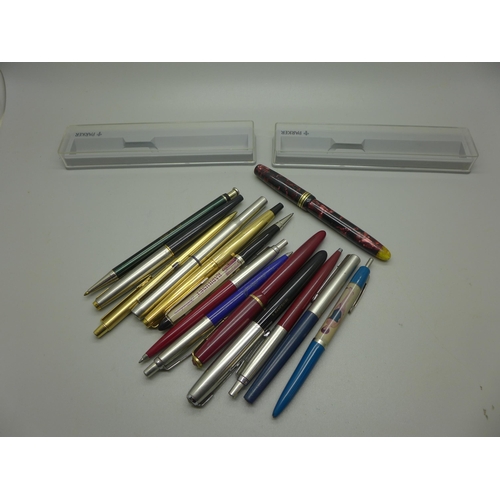 978 - A collection of fountain and ballpoint pens, some with gold nibs, mainly Parker