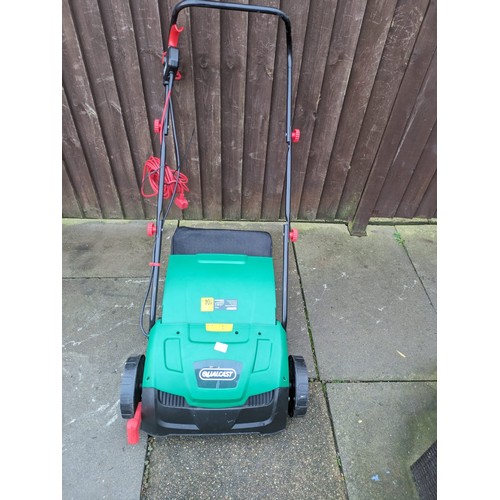 2299 - A Qualcast lawn rake and scarifier - only used once - W