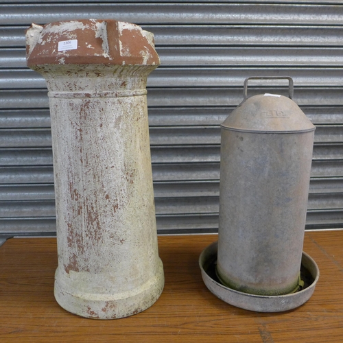 2306 - A galvanised poultry feeder and a terracotta chimney pot