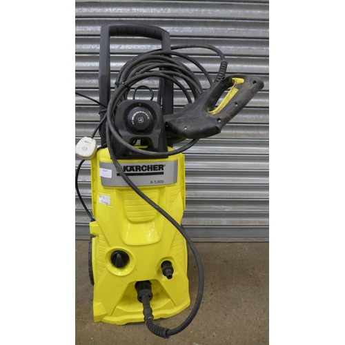 2307 - A Karcher K5.600 jet wash with attachments - W