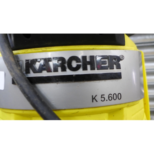 2307 - A Karcher K5.600 jet wash with attachments - W