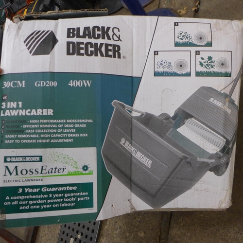 2312 - A Black & Decker 3 in 1 lawn carer - boxed - W