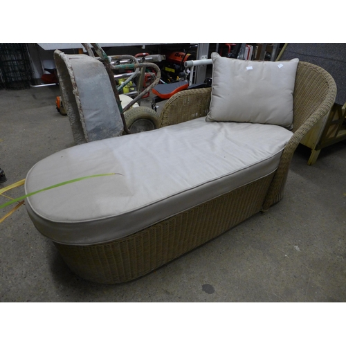 2358 - A rattan chaise lounge