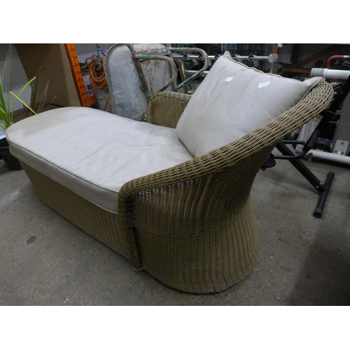 2358 - A rattan chaise lounge