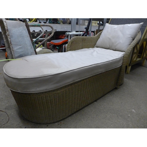 2358 - A rattan chaise lounge