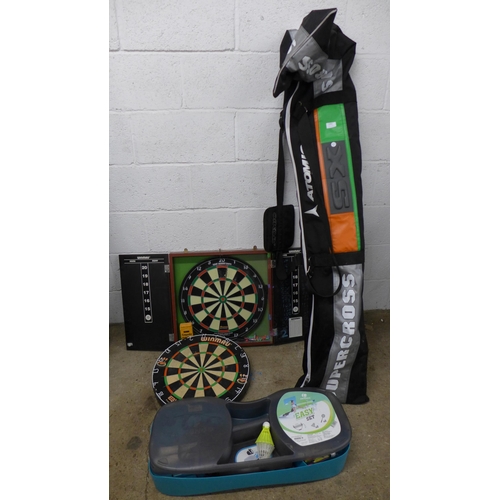 2362 - A selection of sports equipment; 2 dartboards, 1 Winmau and one other, badminton raquets, Atomic ski... 