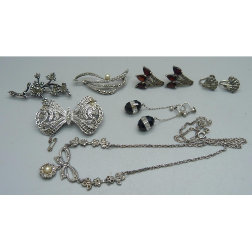 1033 - A silver and marcasite necklace, two pairs of silver earrings, one pair of unmarked earrings, two co... 