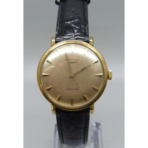 1034 - A Longines 18ct gold wristwatch, 35mm case including crown, with presentation inscription to case ba... 